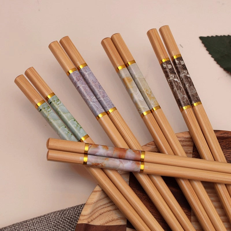Premium Nanzhu Chopsticks for Home Use, Featuring Antibacterial Properties, a Non-Slip Design, And Resistance To. Made from Natural Nanzhu, They Can Withstand High Temperatures And Are Free from Paint, with a Set Designed for Individual Use