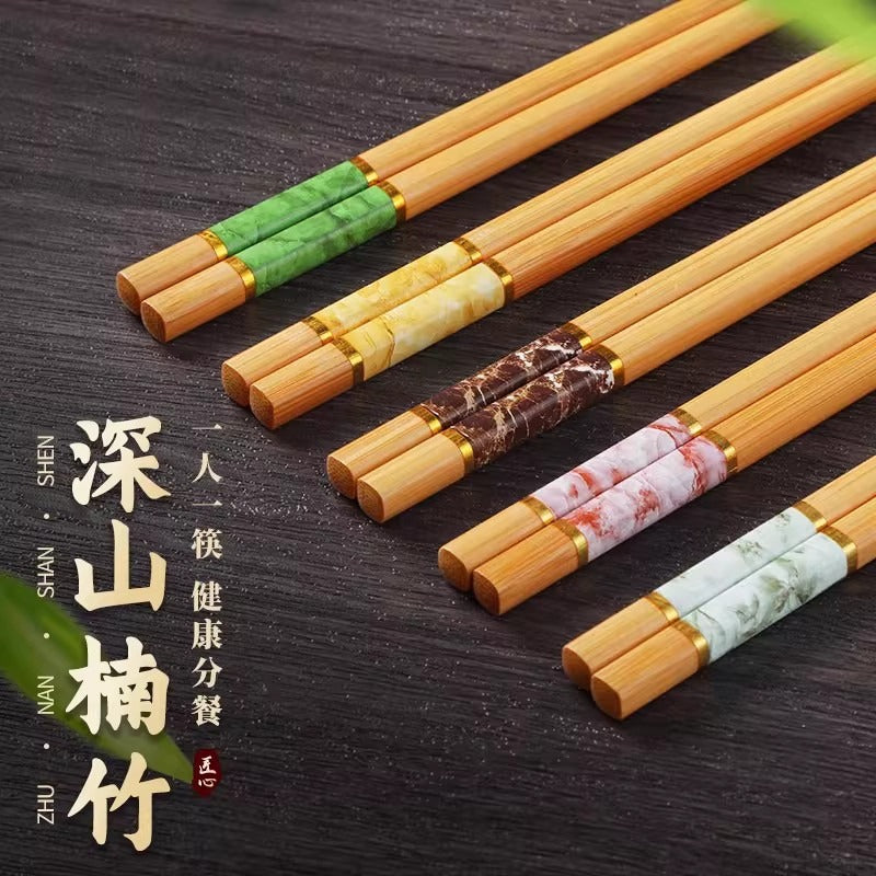 Premium Nanzhu Chopsticks for Home Use, Featuring Antibacterial Properties, a Non-Slip Design, And Resistance To. Made from Natural Nanzhu, They Can Withstand High Temperatures And Are Free from Paint, with a Set Designed for Individual Use